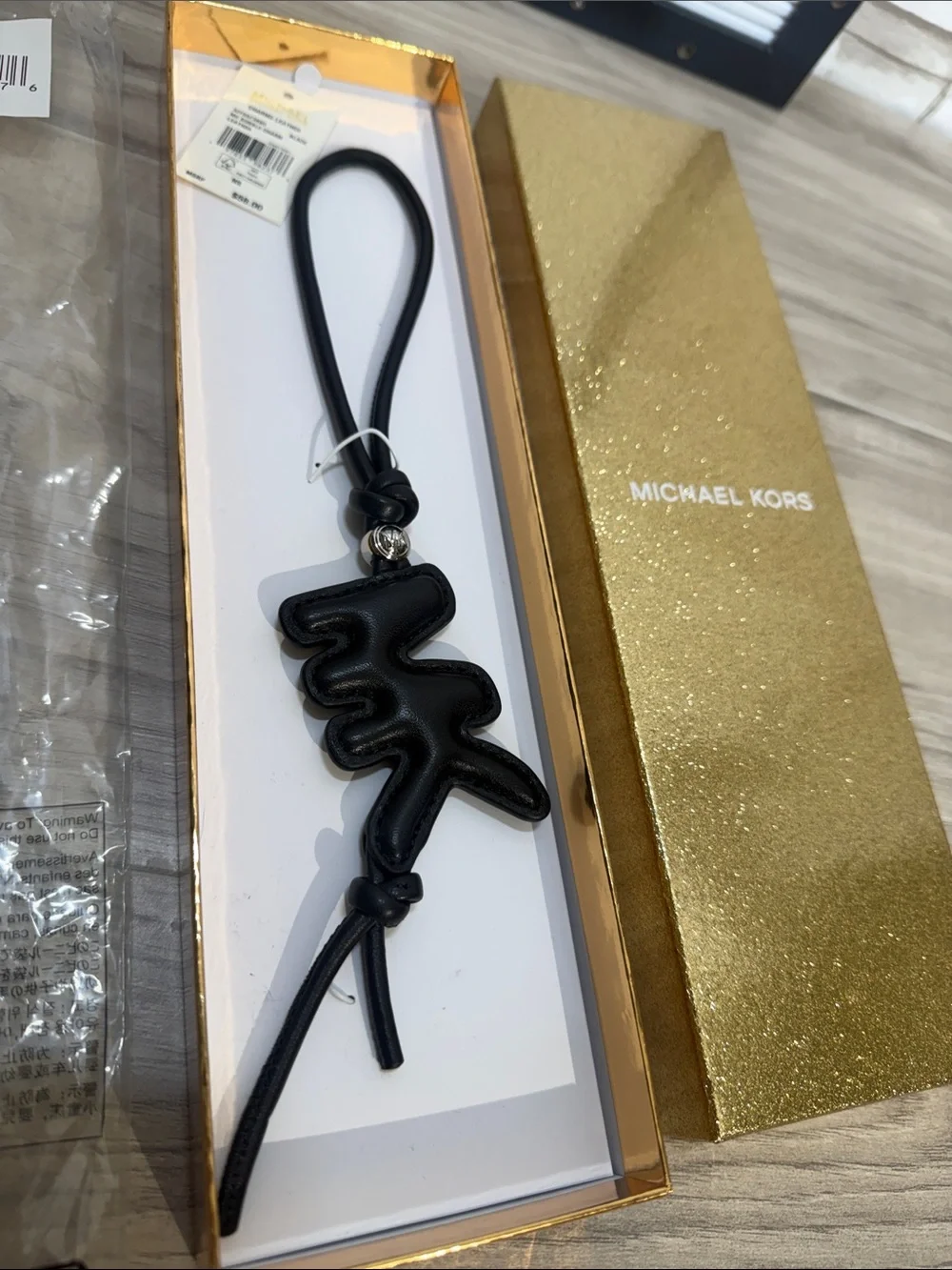 Michael Kors Black Puffy Logo Leather Bag Charm